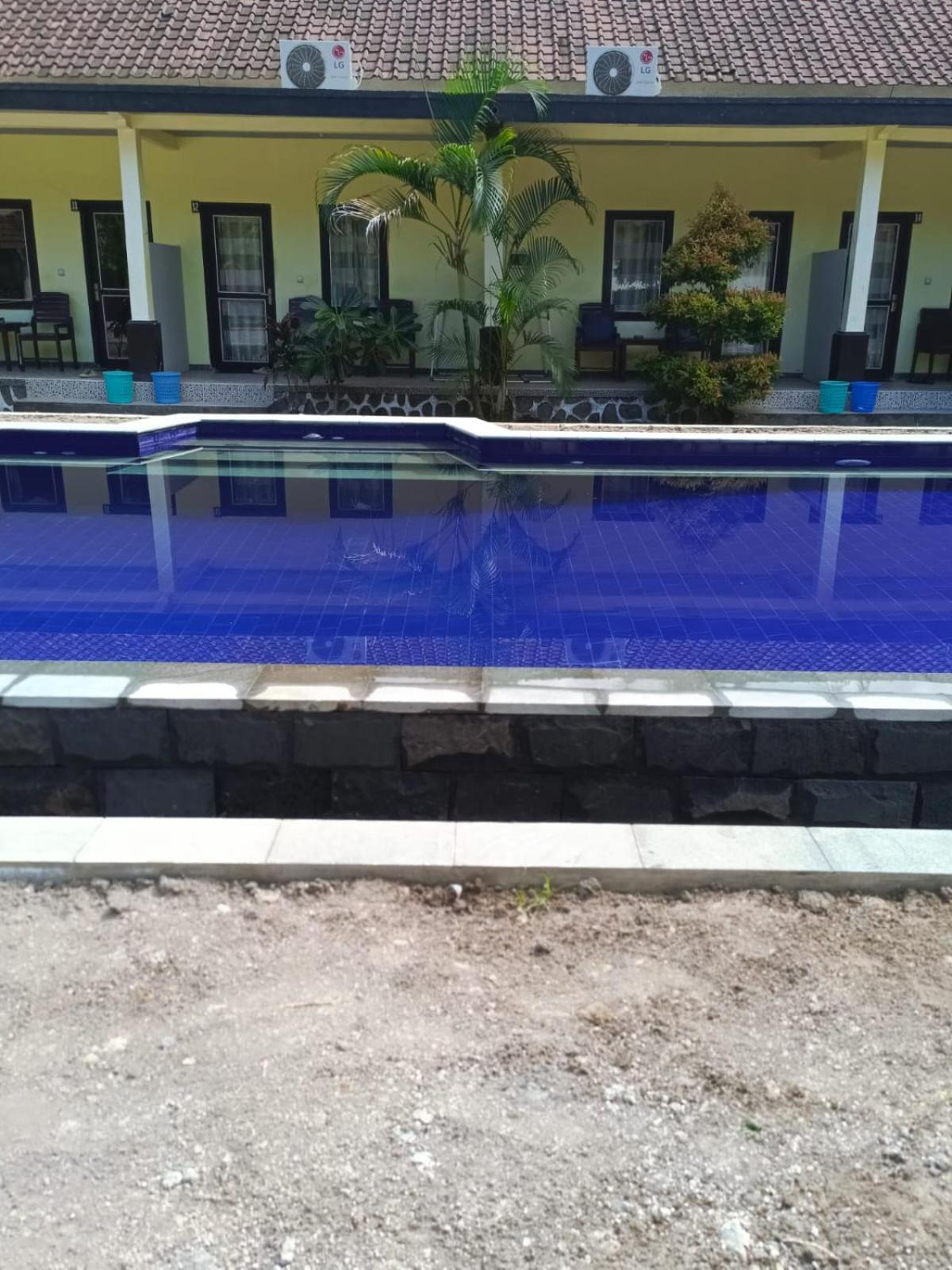 Kuta Lodge Homestay Buitenkant foto